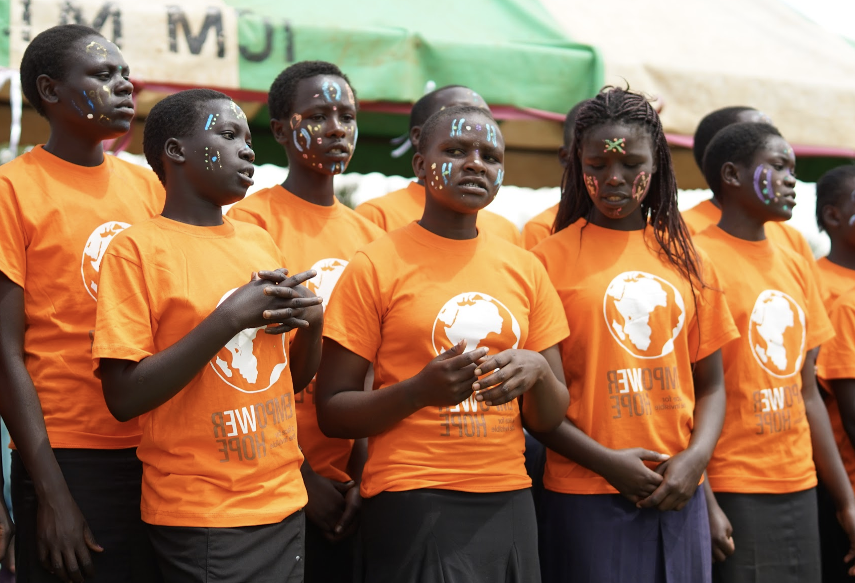 Empower Hope Girls in Orange Shirts